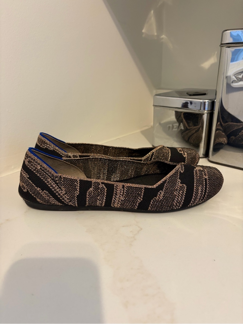 Rothy’s black/tan knit ballet flat